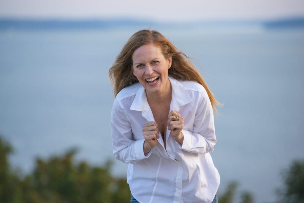Jennifer Whitaker laughing by Puget Sound